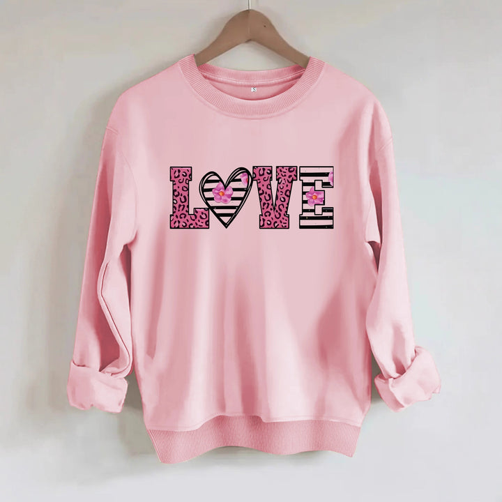 Dame sweatshirt med moderne leopard hjerte-design og behagelig passform Skjora