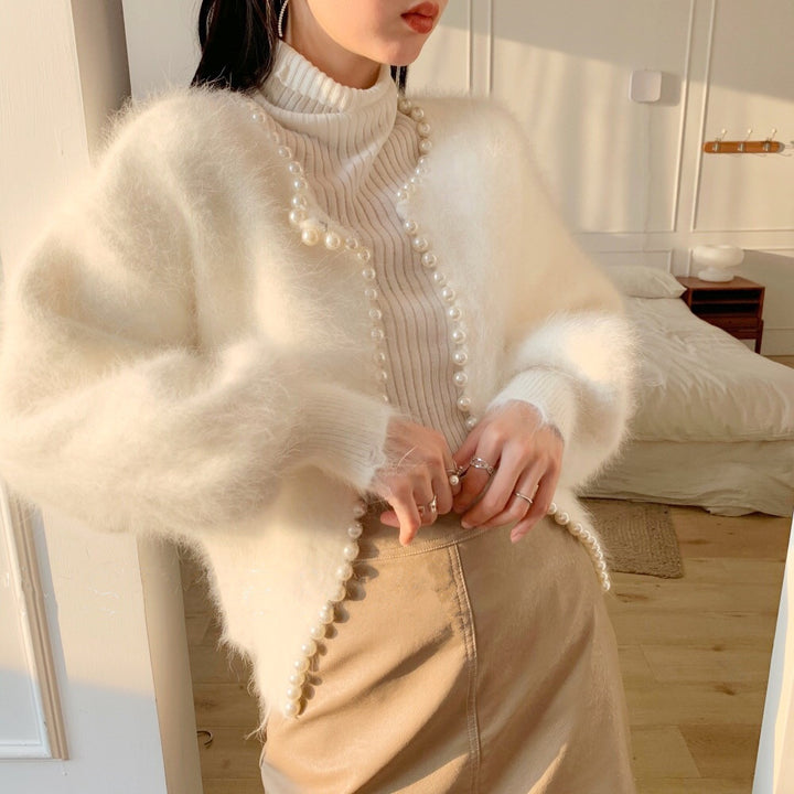 Kvinnens fluffy cardigan med perlekant og trendysnitt Skjora