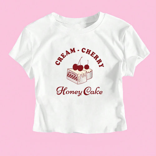 Dame Crop-T-skjorte med kreativ dessertmotiv og moderne snitt Skjora