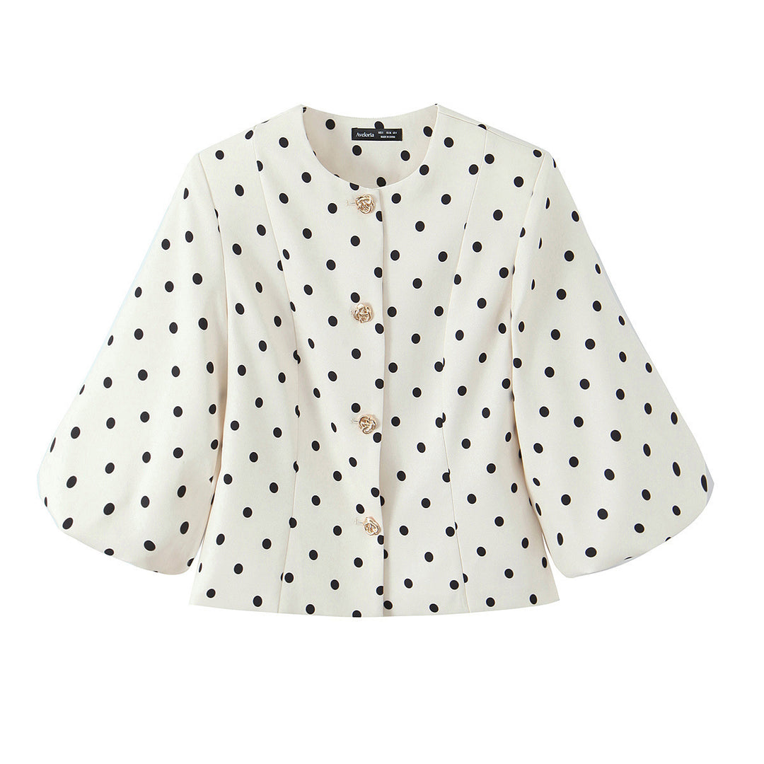 Damebluse med voluminøse ermer og polka-prikk mønster Skjora