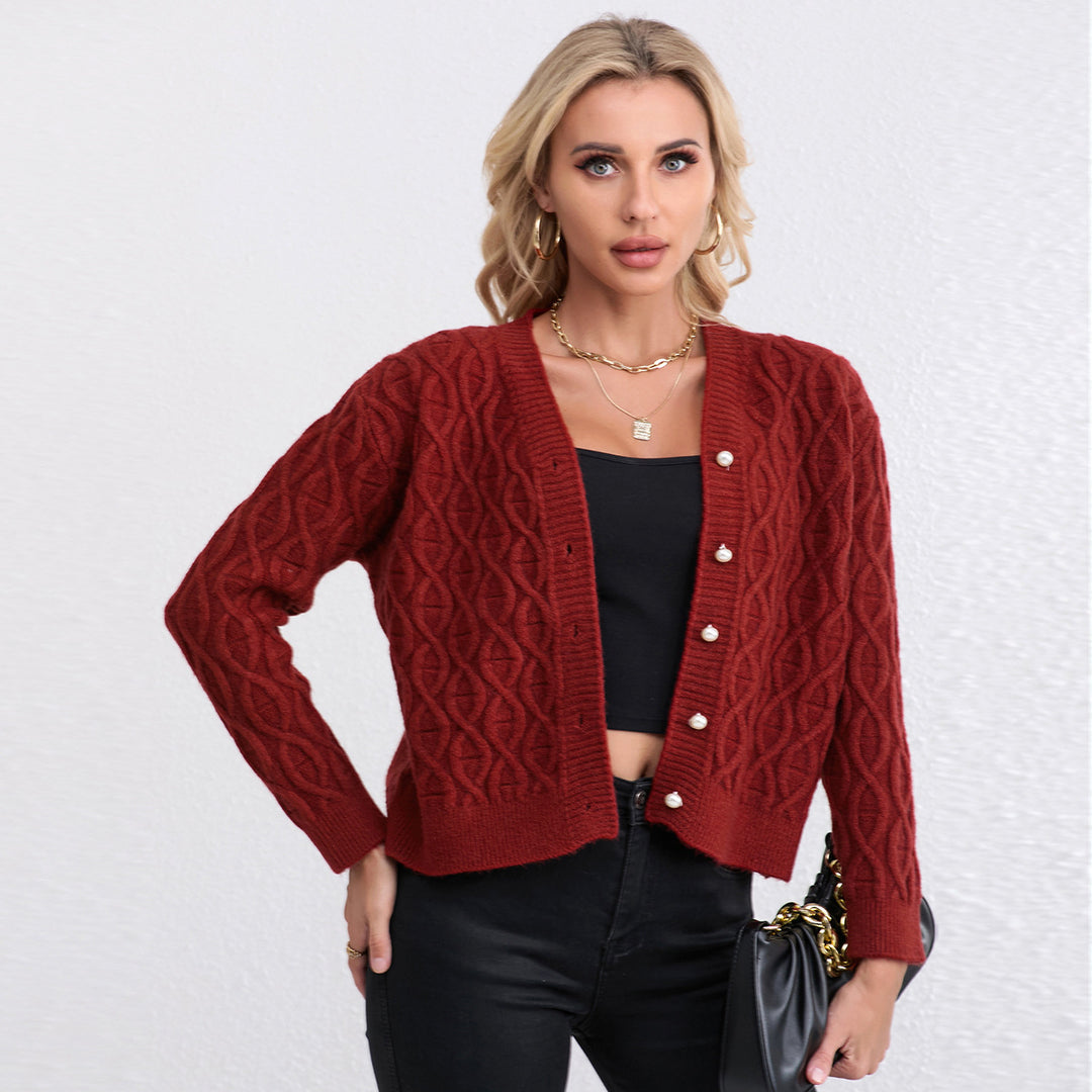 Women's designer cardigan with cable pattern and soft colors Skjora