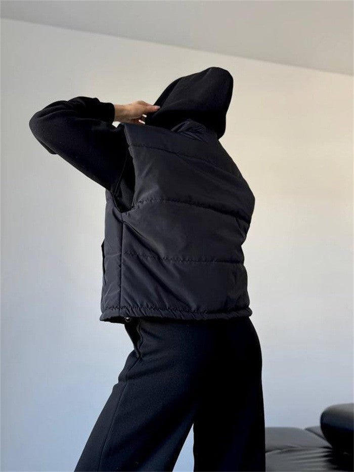 Kvindes quilted vest med hætte Skjora