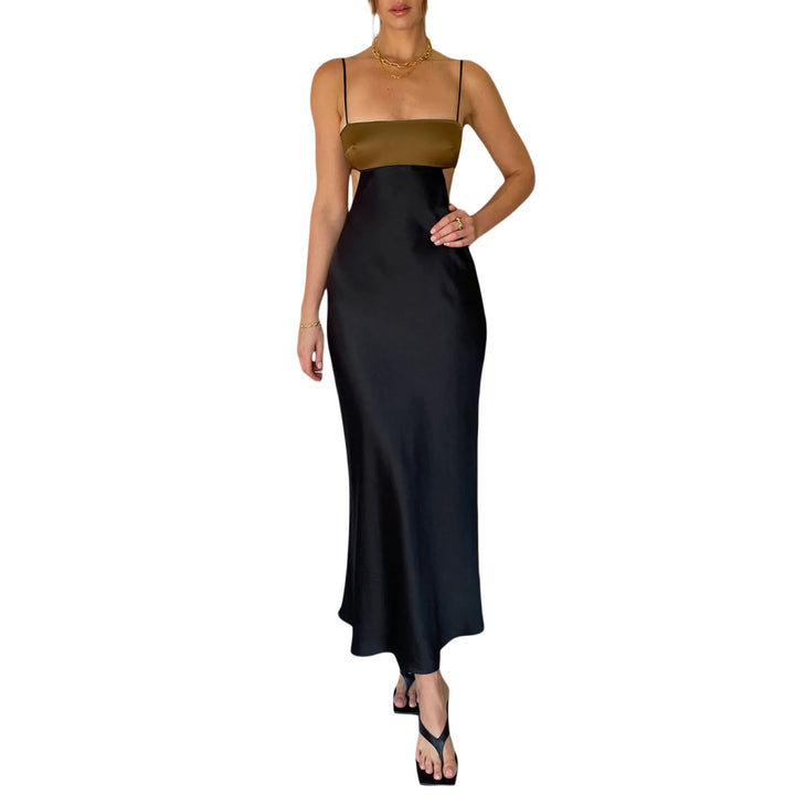 Damer elegant lang kjole med innovativt cut-out design og delikate spaghetti-stropper Skjora