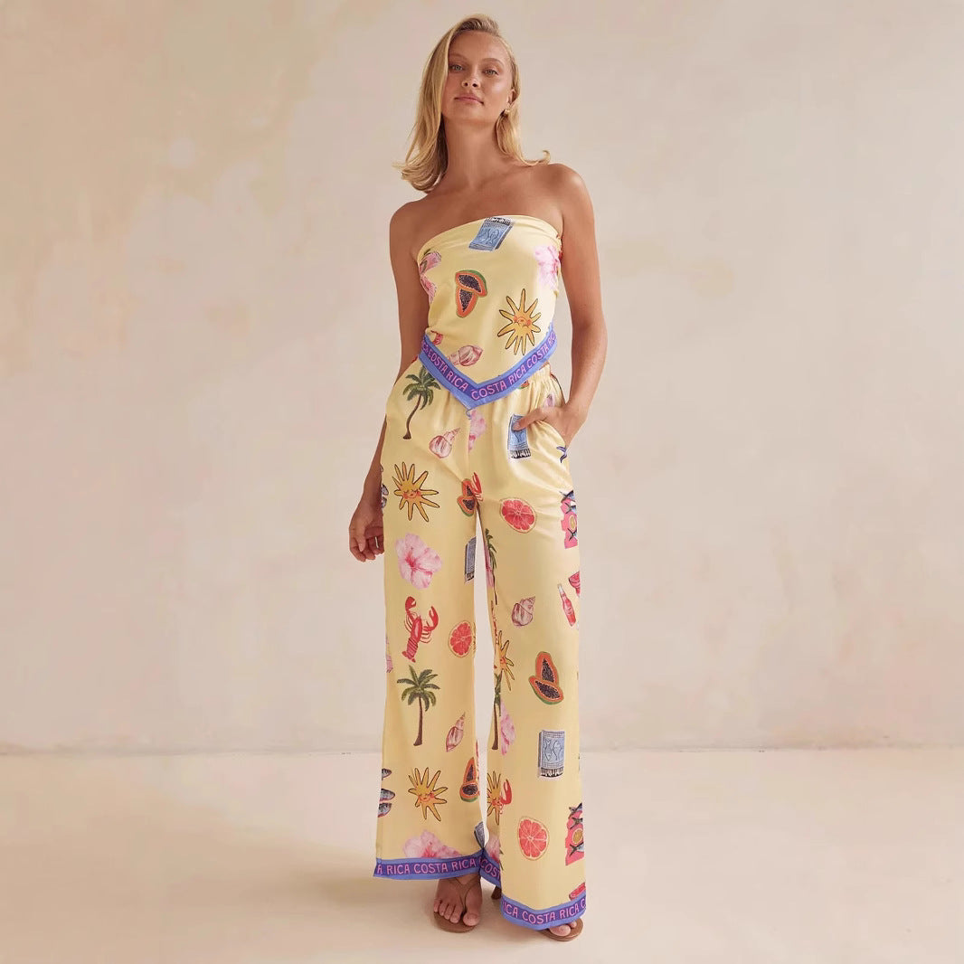 Kvinnens jumpsuit med lekne tropiske mønstre og elastisk topp Skjora