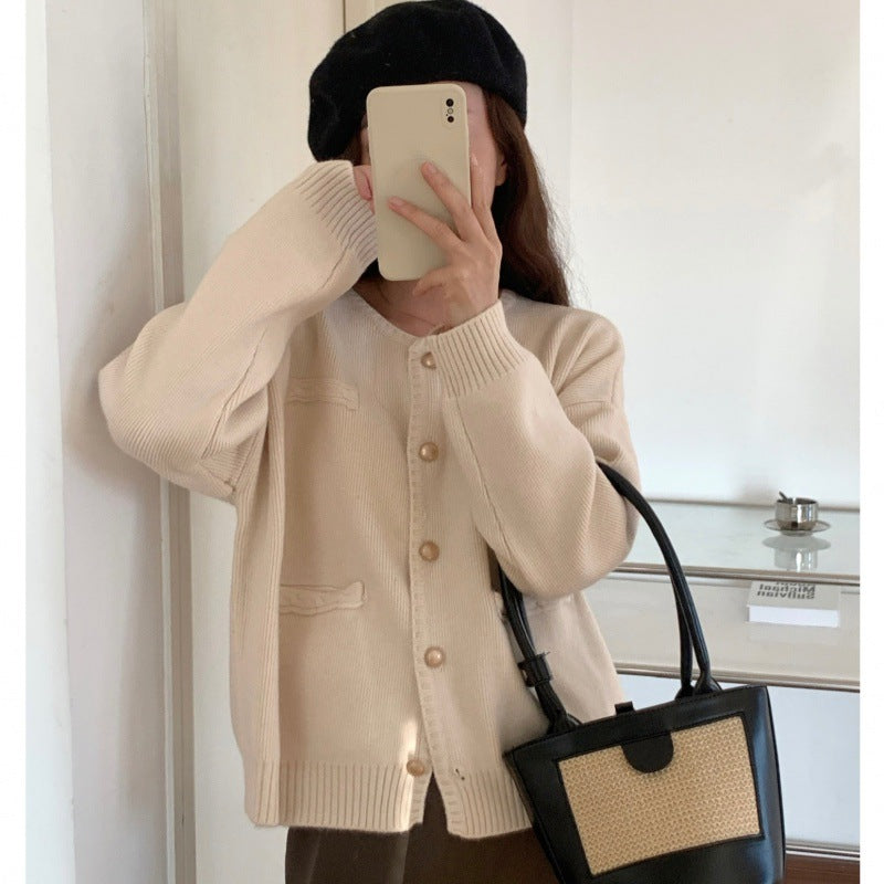 Dame cardigan med knappe detaljer og romslige lommer Skjora