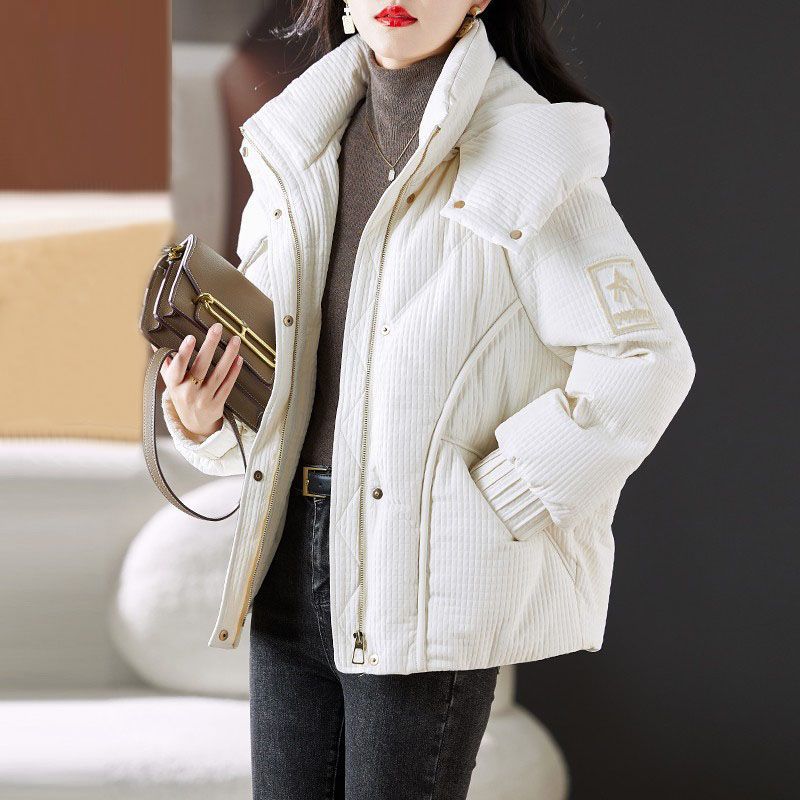 Dames oversized quilted jakke med praktisk hette-design Skjora