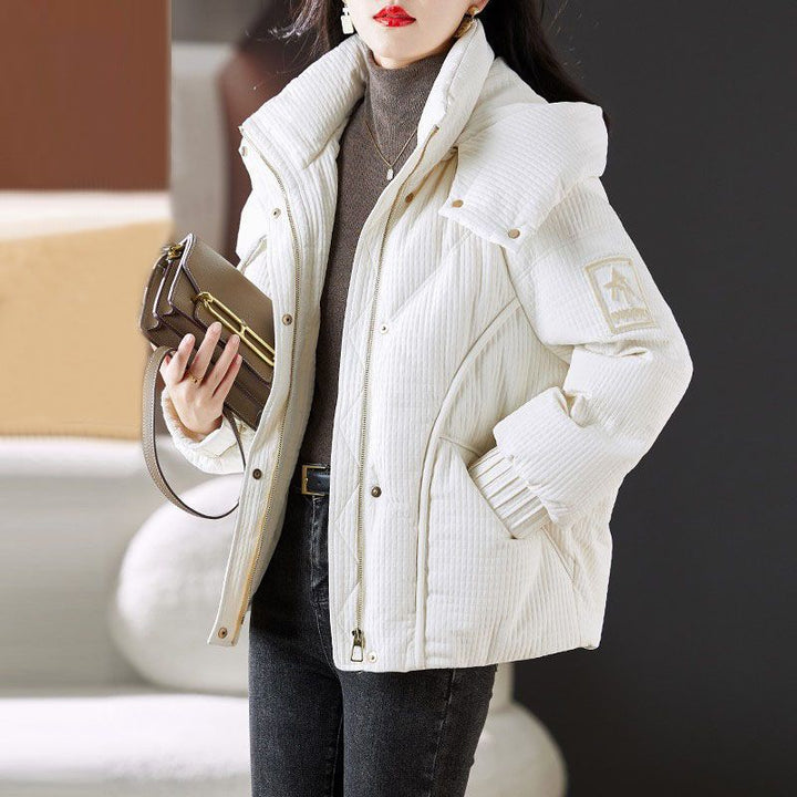 Dames oversized quilted jakke med praktisk hette-design Skjora