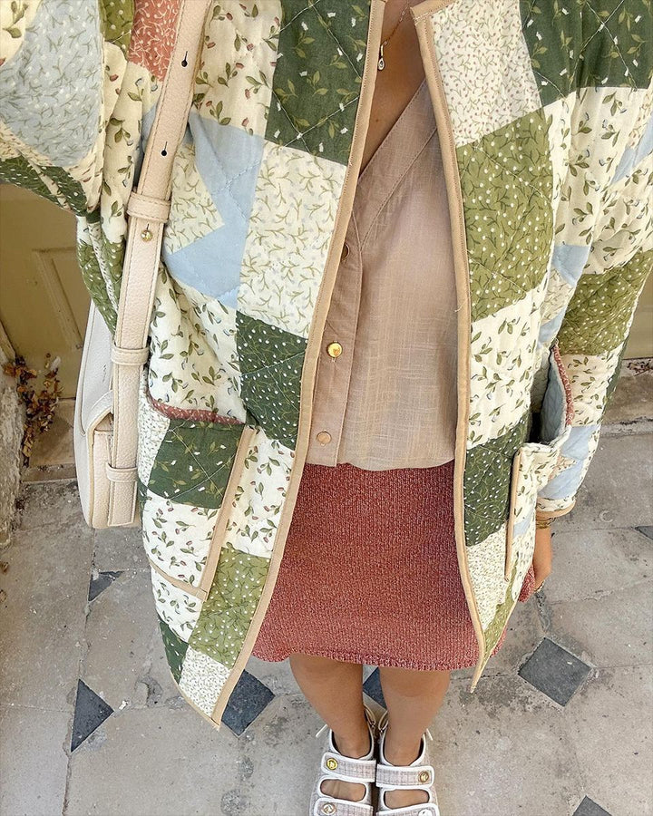 Women's patchwork quilted jacket with floral design and visible button placket Skjora