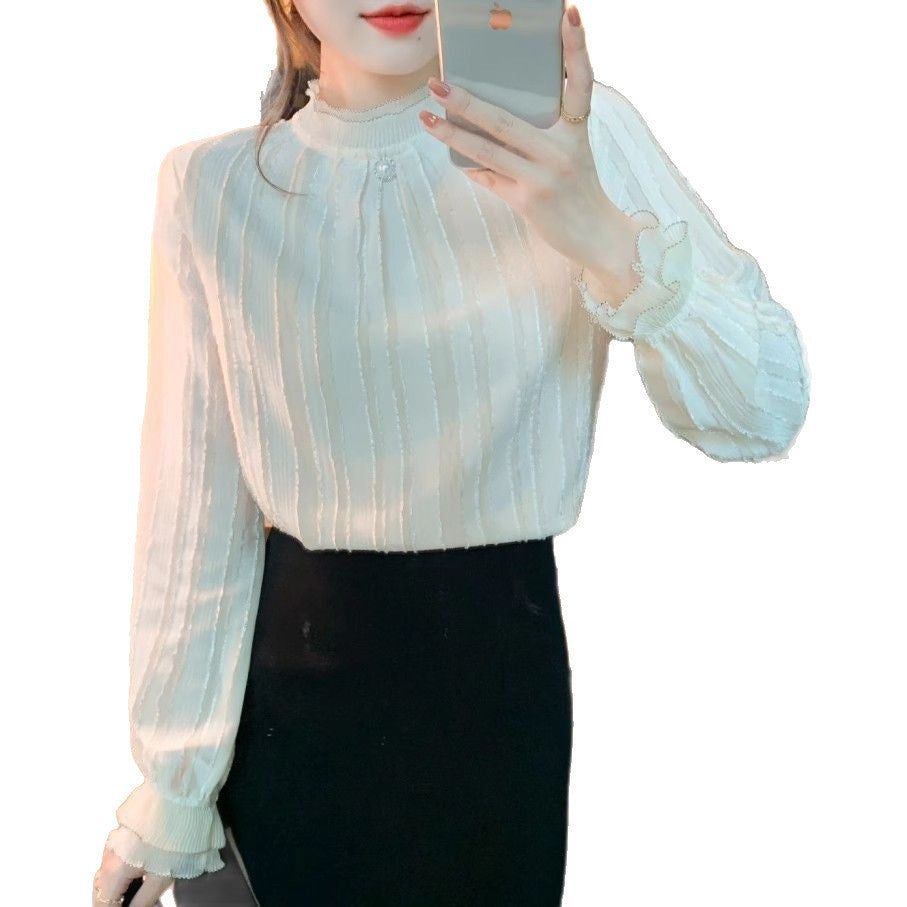 Damer elegant bluse med teksturdesign og volangkant Skjora