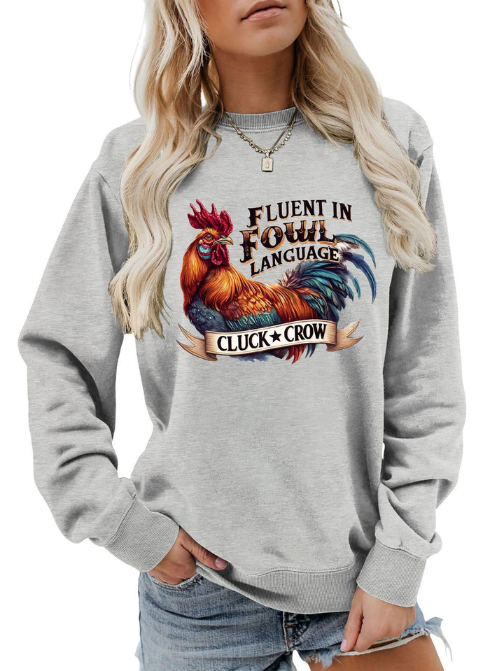 Dame sweatshirt med humoristisk kyllingmotiv og behagelig passform Skjora