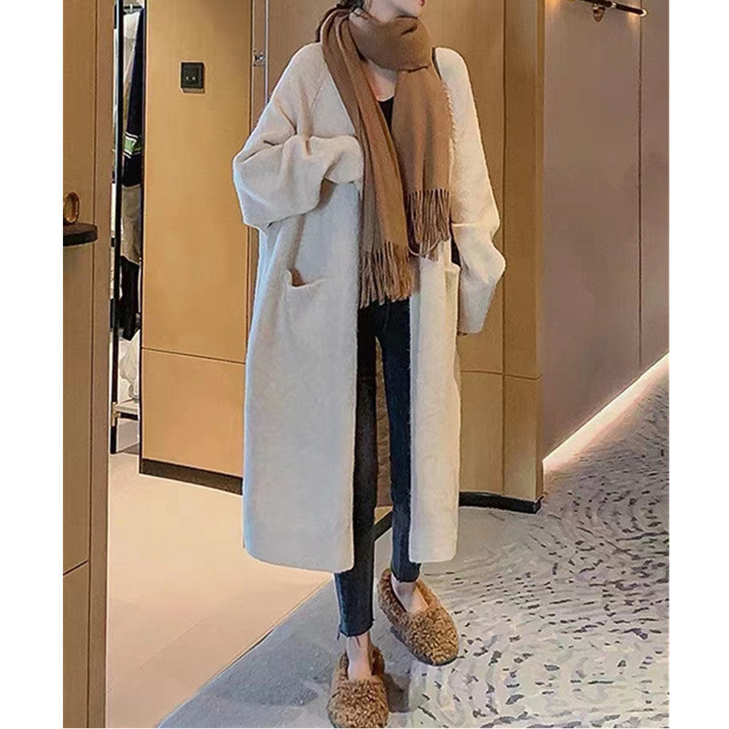 Dame oversized strikket jakke med lommer og avslappet passform Skjora