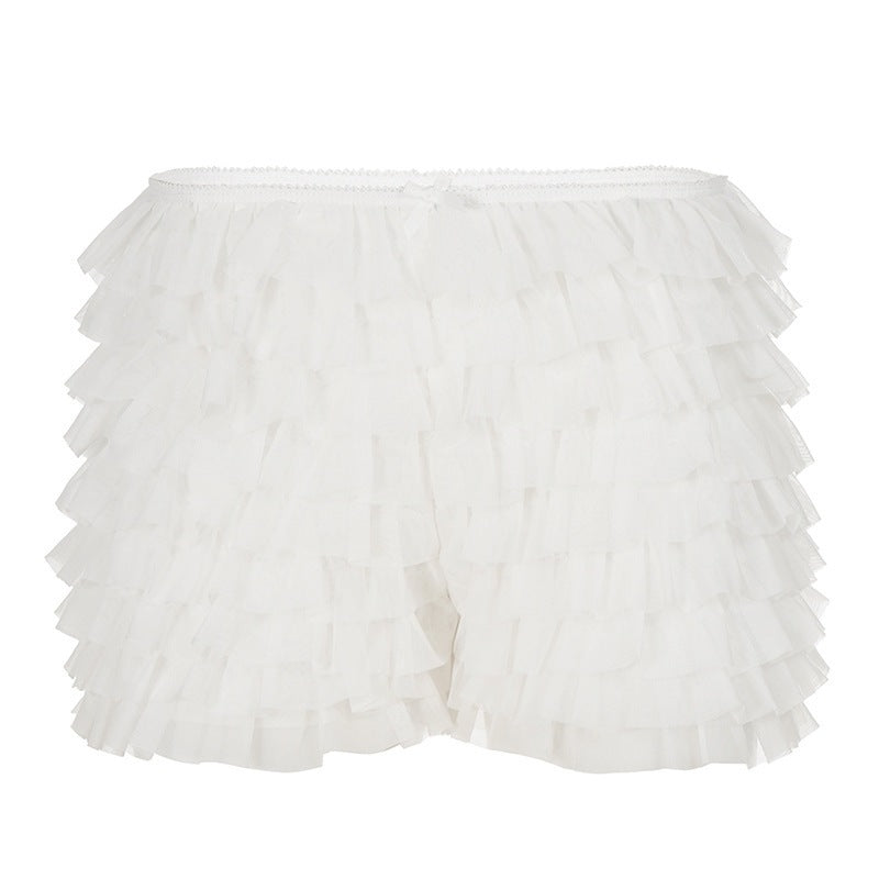 Dame volangshorts med elastisk belte og lekent design Skjora