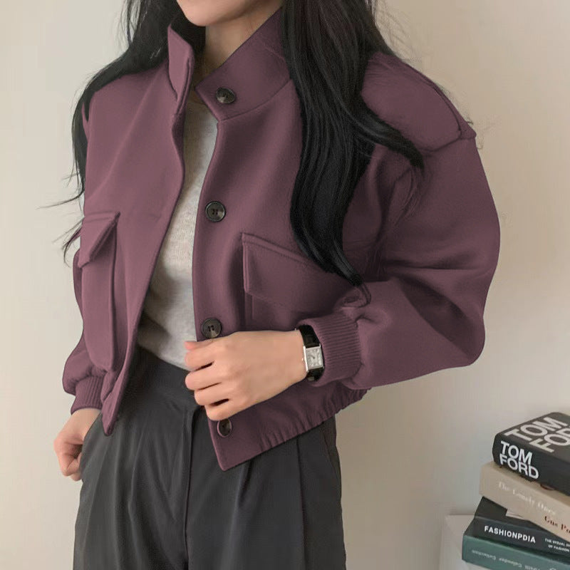 Damejakke laget av høykvalitets ullblanding med casual lommer og oversized snitt