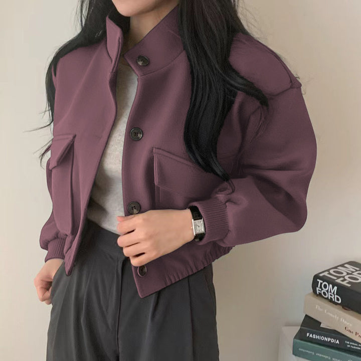 Damejakke laget av høykvalitets ullblanding med casual lommer og oversized snitt