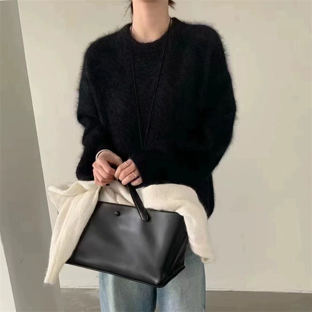 Kvinners fluffy genser med oversized snitt laget av mohairull Skjora