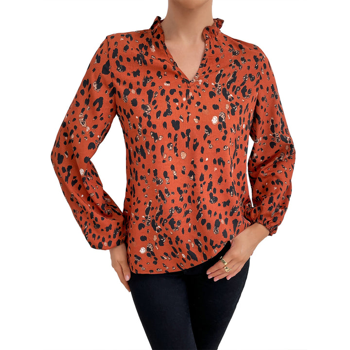 Kvinnes bluse med blomstret leopardmønster og voluminøse ermer Skjora