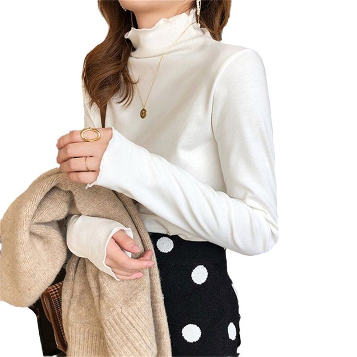 Kvinne Langermet Turtleneck Top med Fin Ribbestrikk Design og Ledig Passform