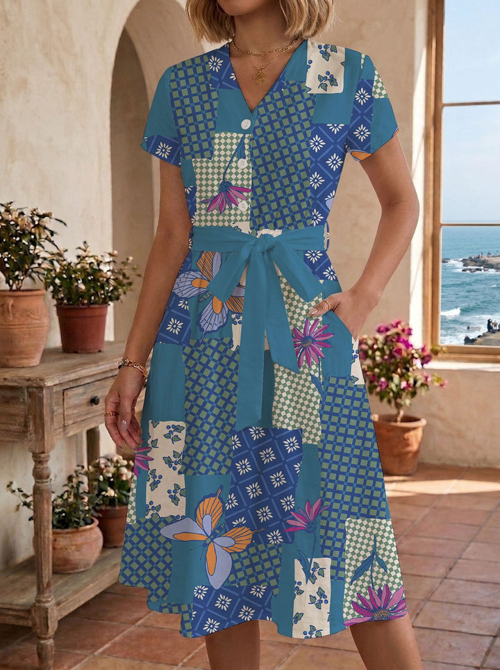 Damen Sommerliches Kleid mit taillierbarem Bindegürtel und floralem Muster Skjora