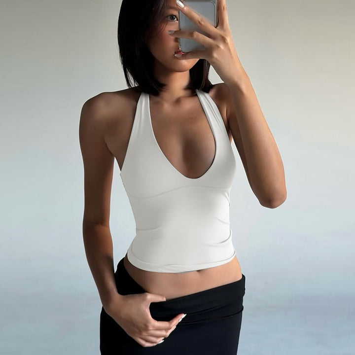 Dame sporty cropped top med V-hals og figurformende snitt Skjora
