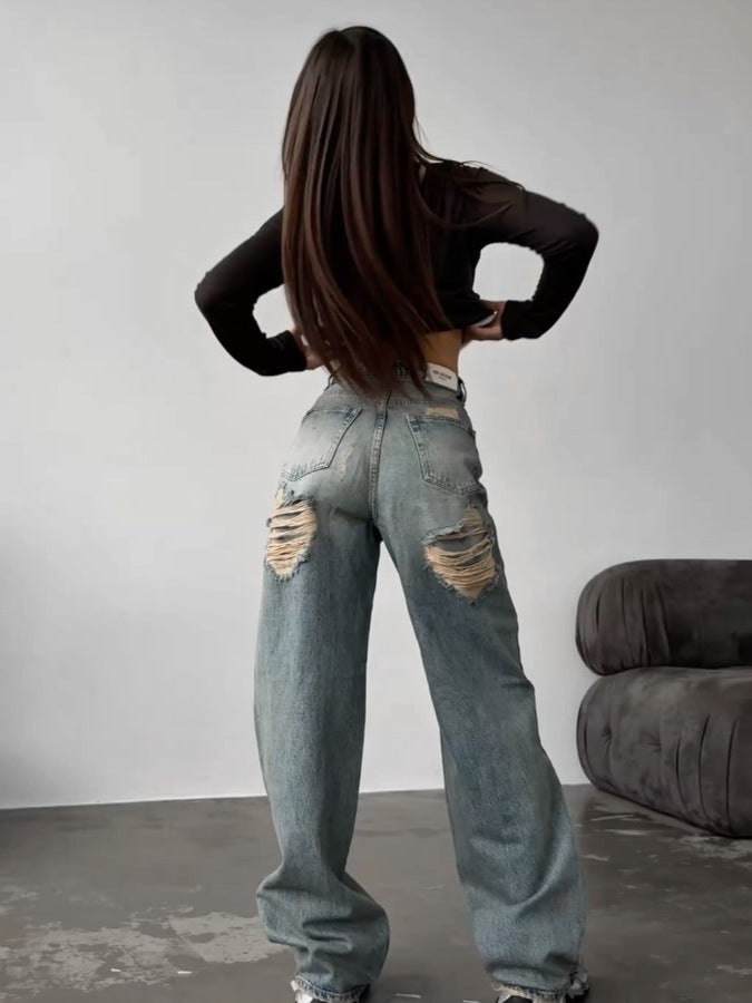 Kvinnenes Baggy Jeans i Vintage Stil med Slitte Detaljer og Høy Midje Skjora