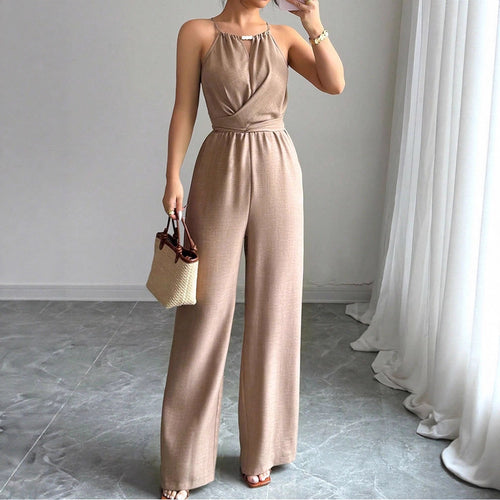 Dame gulvlengde jumpsuit med raffinert omslagdesign og elegant midjebånd Skjora