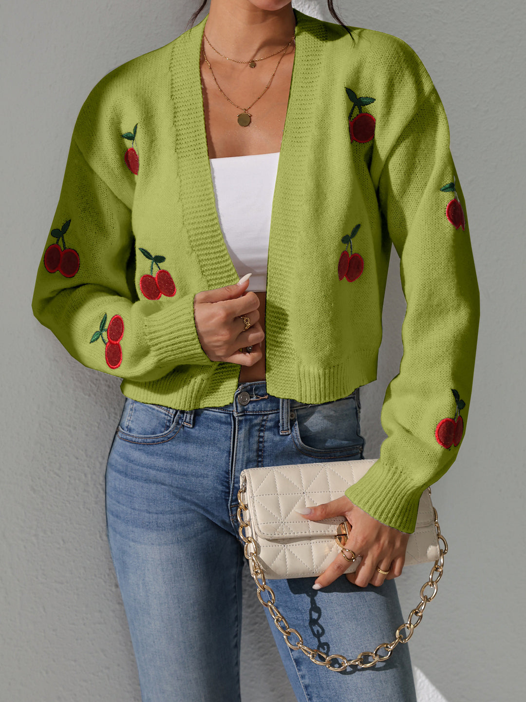 Kvinnens cardigan med blomsterkløver mønster Skjora