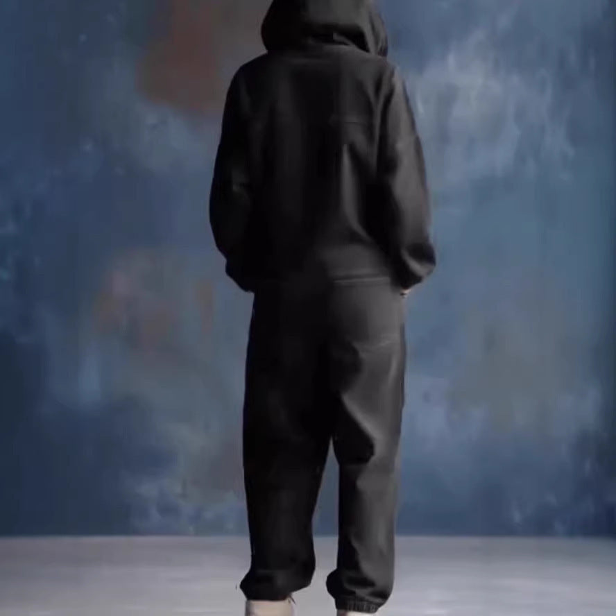 Kvinnes avslappet denim jumpsuit med hette og praktiske lommer Skjora