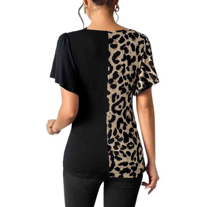 Dame Trendy topp med asymmetrisk design og raffinerte cut-outs Skjora