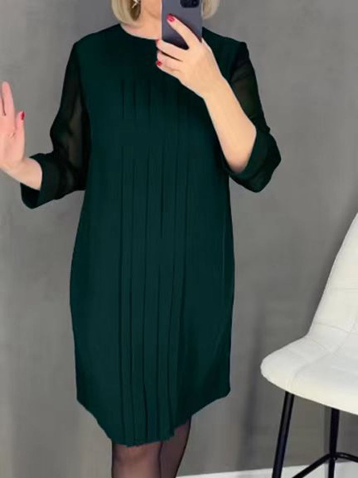 Kvinne elegant volangkjole med transparente ermer Skjora