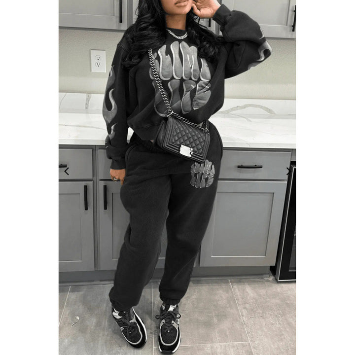 Kvinne tracksuit med trendy grafisk design og sporty passform Skjora