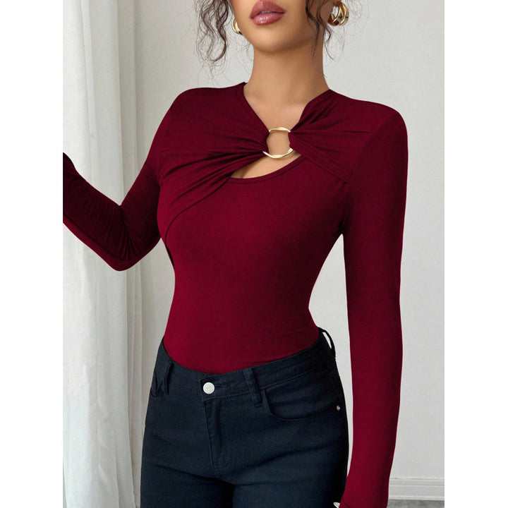 Dame bodysuit med dekorativ ringdetalj og lange ermer Skjora