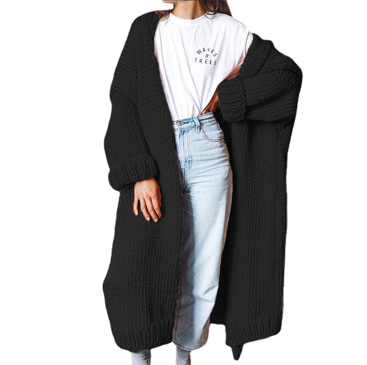 Dame chunky strikket cardigan med komfortabel oversized passform og dype lommer Skjora