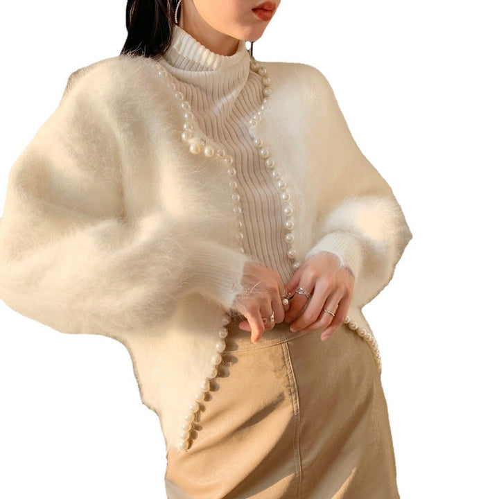 Kvinnens fluffy cardigan med perlekant og trendysnitt Skjora