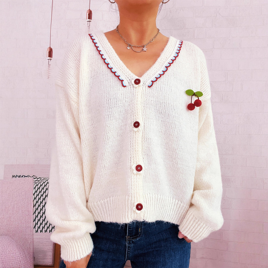 Dame koselig cardigan med lekent blomsterdesign og knappedetaljer Skjora