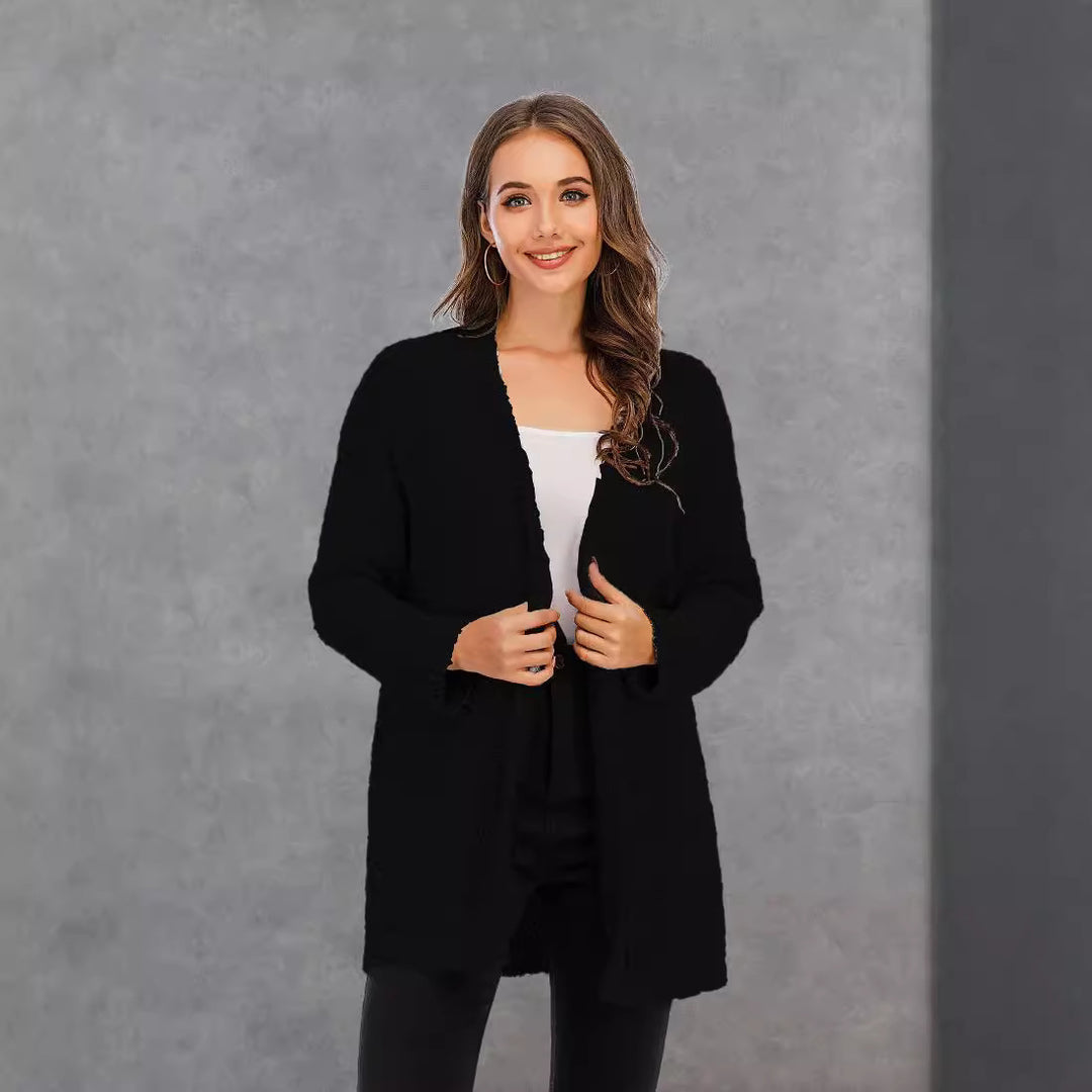 Kvinnekomfortabel cardigan med åpen skjæring og store lommer Skjora
