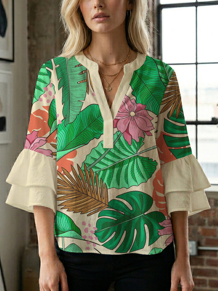 Dame bluse med voluminøse rysjermer og moderne motiv Skjora