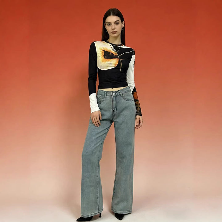 Dameviddejeans med kunstnerisk sommerfugl-design Skjora