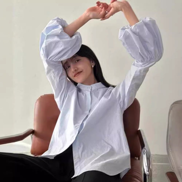 Dame Elegant bluse med voluminøse ermer og ståkrage Skjora