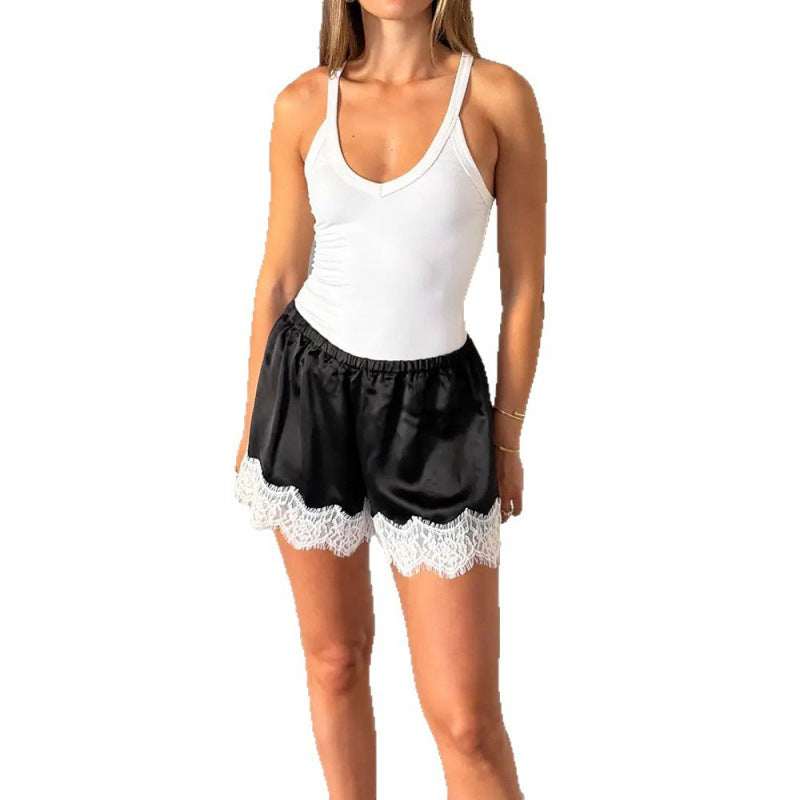Dame Sportbodysuit med elastiske shorts og blonderdetalj Skjora
