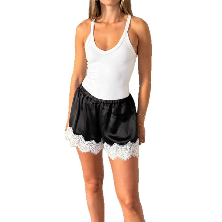 Dame Sportbodysuit med elastiske shorts og blonderdetalj Skjora