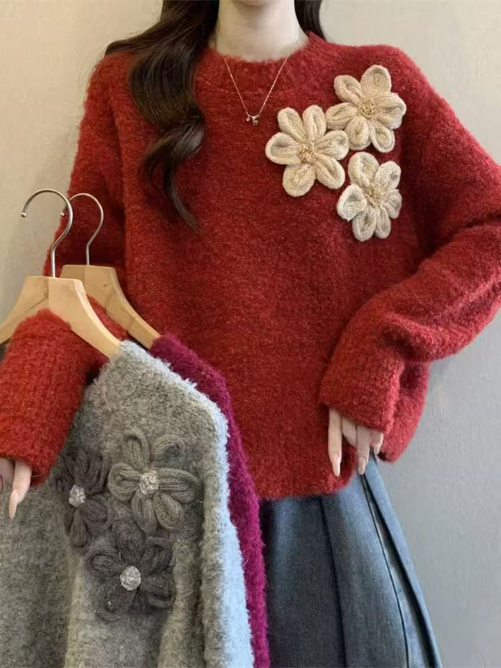 Kvinnens koselige genser med blomstrete 3D-design Skjora