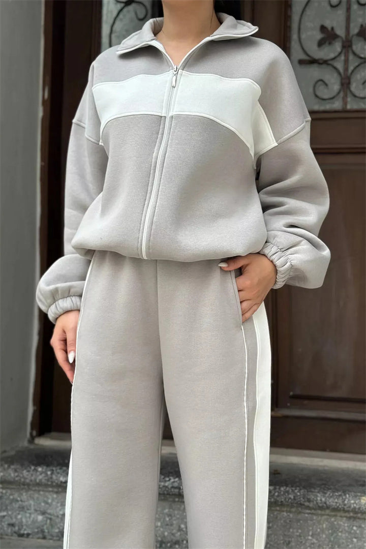 Kvinnelig sporty fleece treningsdrakt med hel glidelås og elastiske mansjetter Skjora