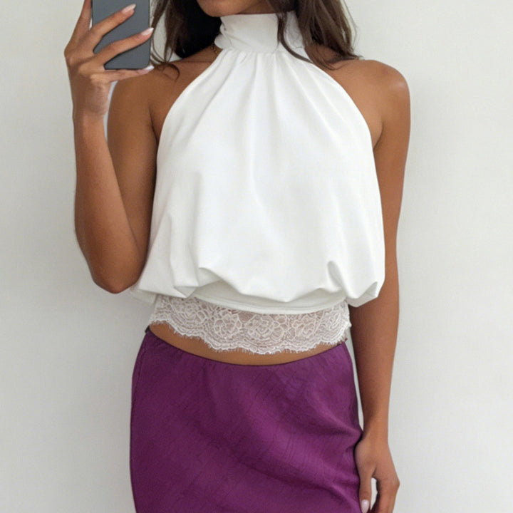 Women's elegant halter neck top with lace details and loose fit Skjora