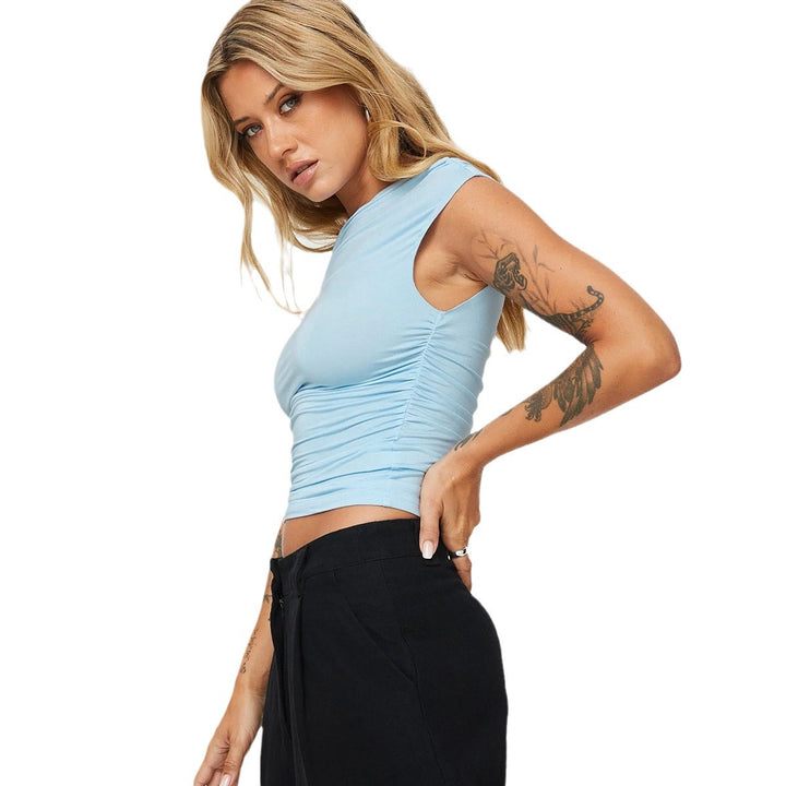 Dame asymmetrisk overdel med off-shoulder design og elegant snitt Skjora