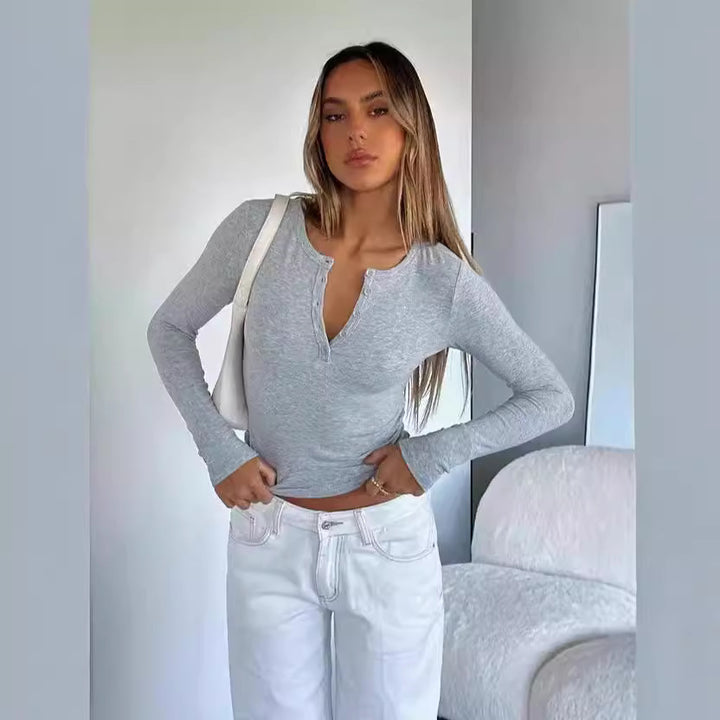 Dame Langermet Crop-Top med elegant V-åpning og figurnær passform Skjora