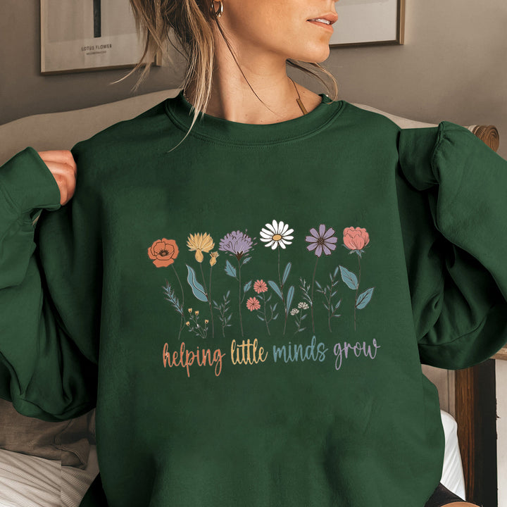 Kvinnesweatshirt med voluminøse ermer og motiverende blomstertrykk Skjora