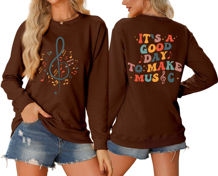 Dame sweatshirt med musikalsk motiv og kreativ skrift Skjora