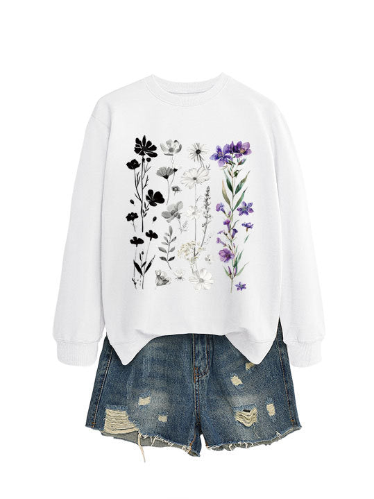 Dame sweatshirt med blomster grafisk design og myk innvendig fôr Skjora