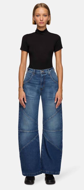 Damer brede jeans med unikt sømdesign i den trendy stilen Skjora