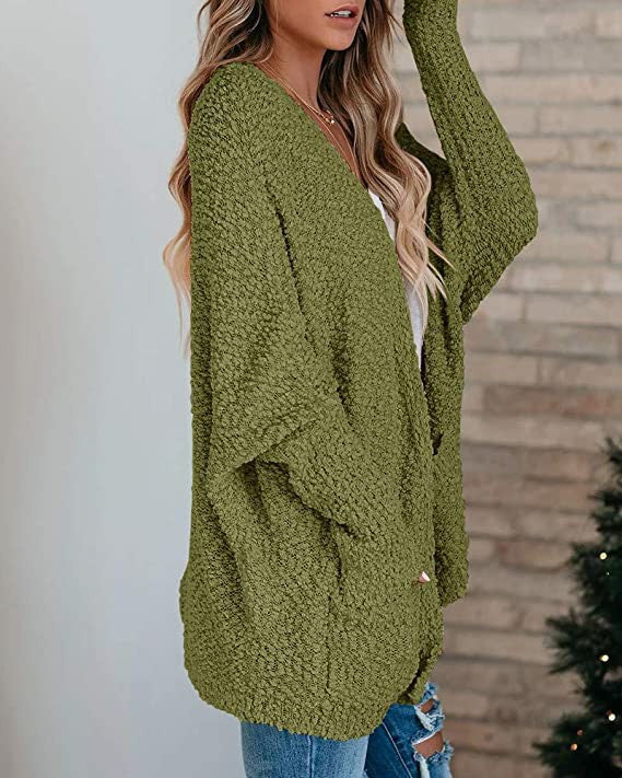 Kvinnekomfortabel cardigan med åpen skjæring og store lommer Skjora